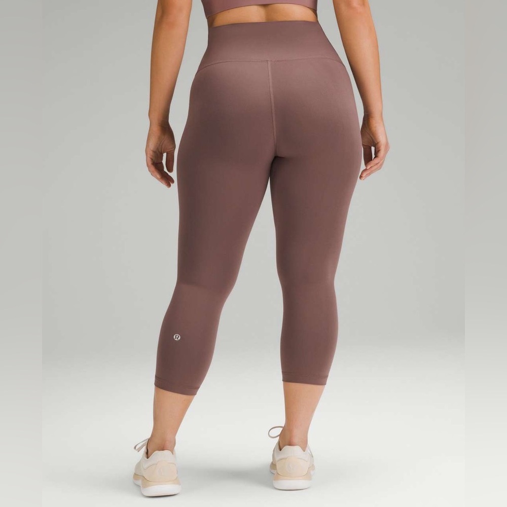 C - Lululemon Wunder Train Contour Fit High-Rise Crop 21"
Dark Oxide